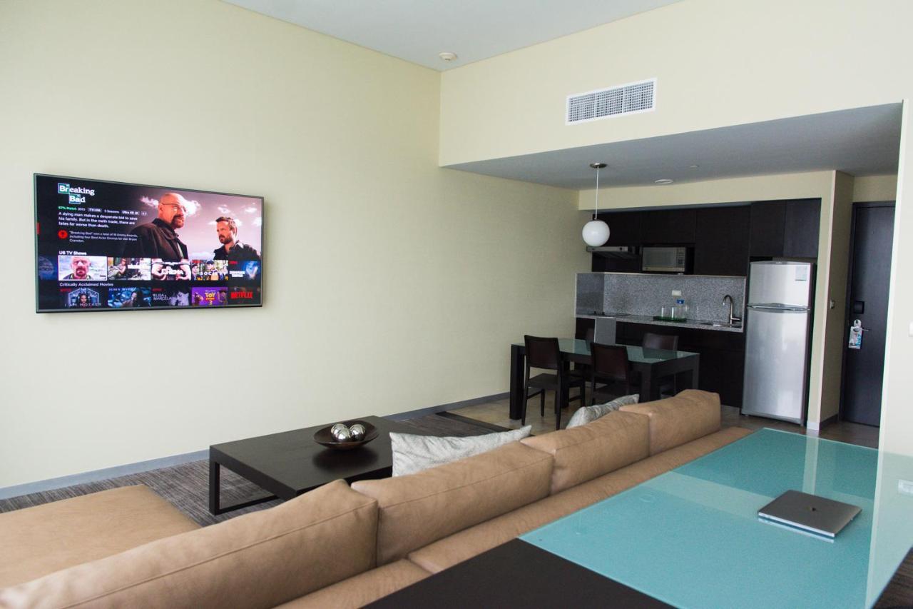 Stadia Suites Mexico City Santa Fe Dış mekan fotoğraf A living room in a typical apartment